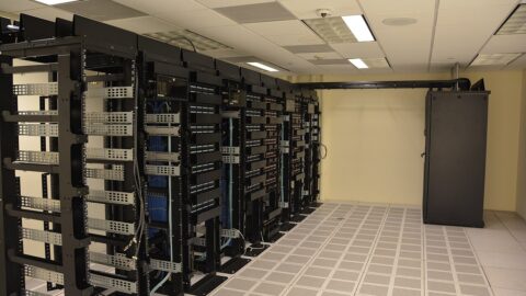 Data center server racks representing data connectivity infrastructure