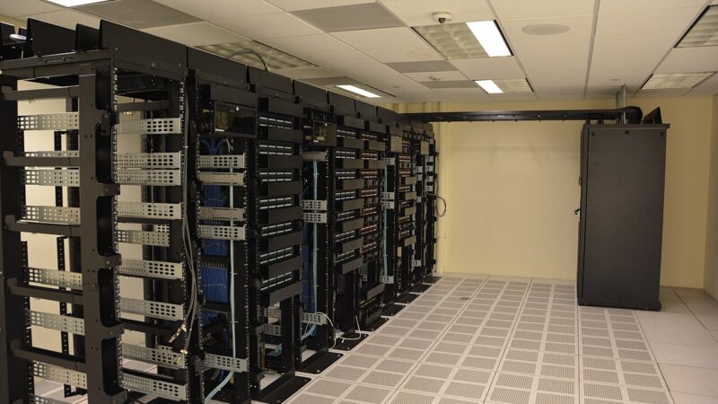 Data center server racks representing data connectivity infrastructure