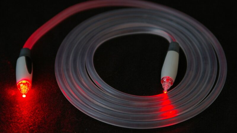 Illuminated fibre optic cable glowing red